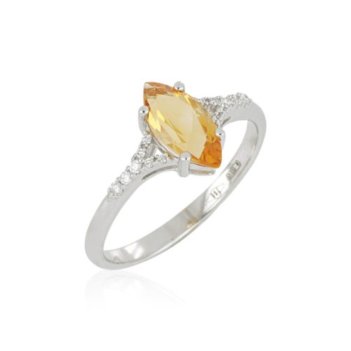 Gold ring with diamonds and precious stone