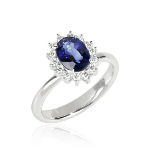 Gold ring with diamonds and precious stone