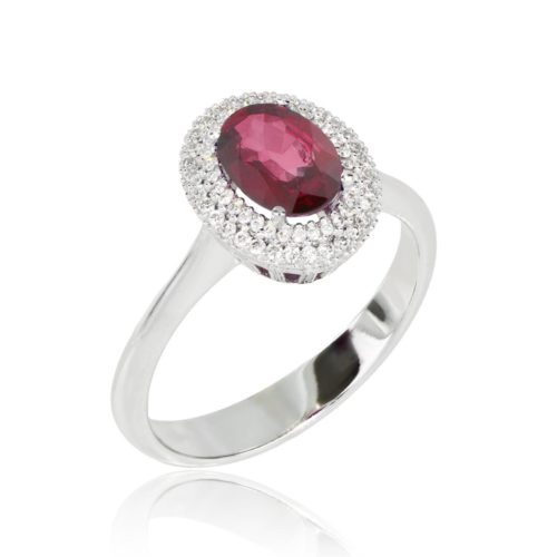 Gold ring with diamonds and precious stone
