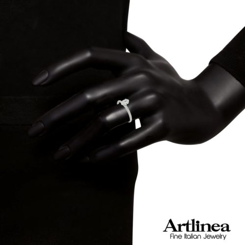 18kt white gold ring with certified oval diamond